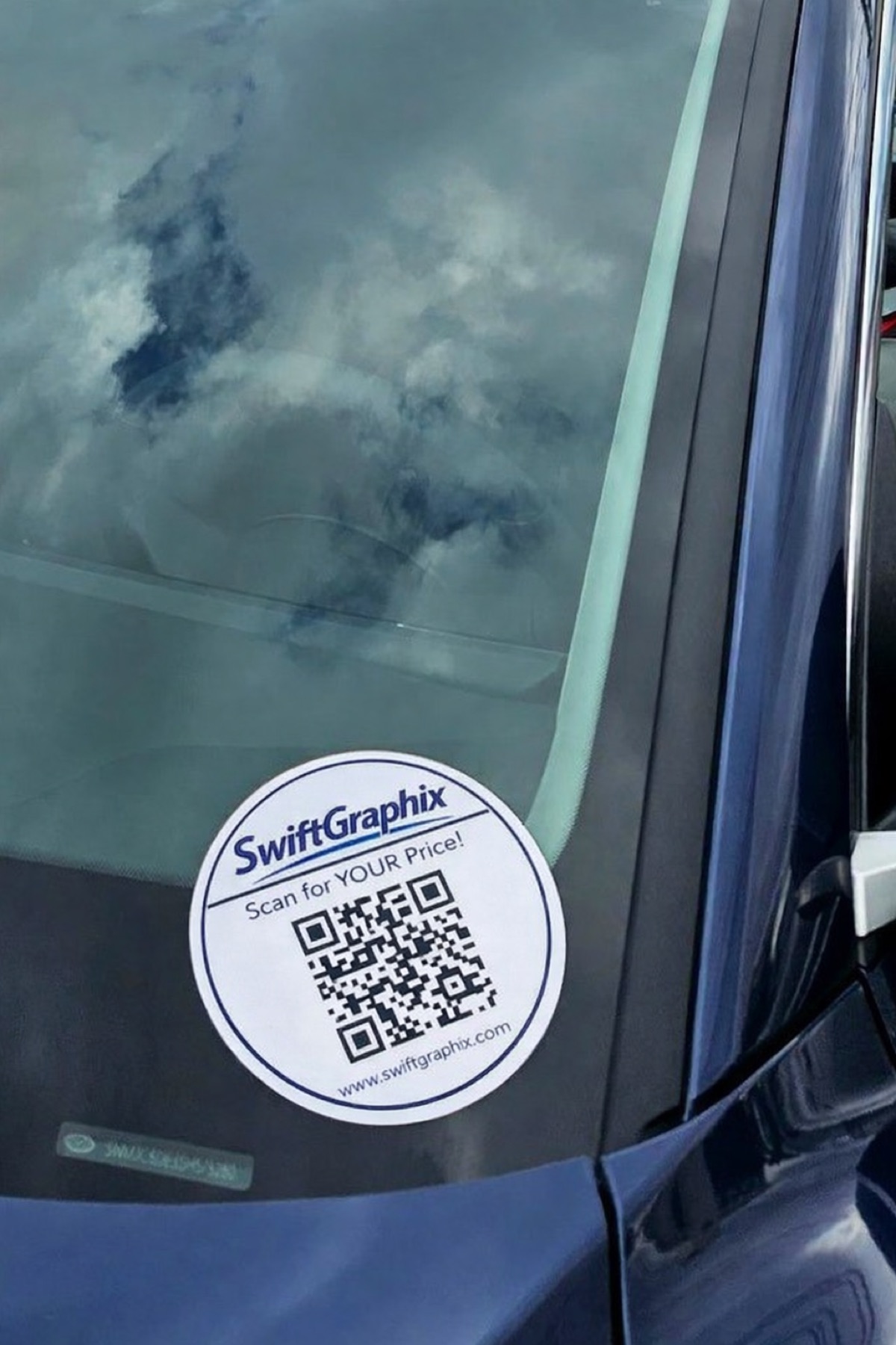 SwiftGraphix QR sticker on dealership windshield