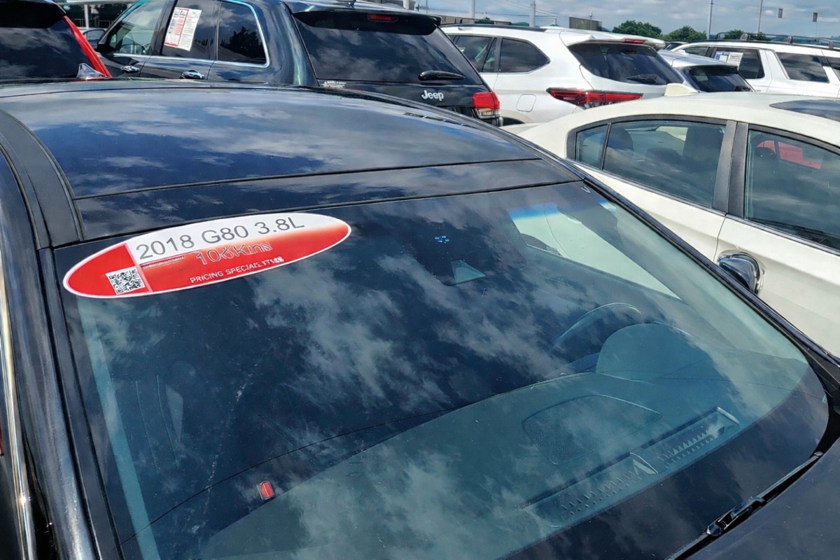 Dealer lot with branded stickers